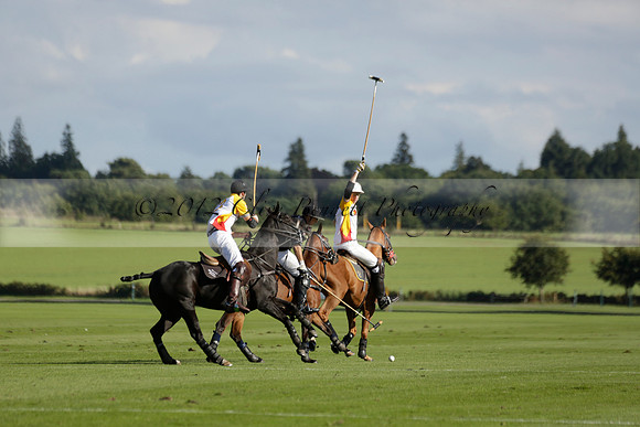 Aryana (black) v Shoreline (yellow) in a Farewell Cup polo match played on Ambersham 5 at Cowdray Park Polo Club on Wednesday 18 September 2013. www.polopictures.co.uk