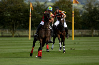 Four Quarters Black (black) v BHC (red) in a Autumn Cup polo match on Ambersham 2 at Cowdray Park Polo Club on Friday 20 September 2013 www.polopictures.co.uk
