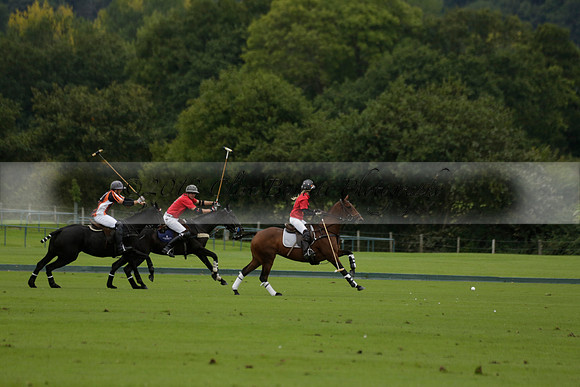 Four Quarters Black (black) v Clashleigh (red) in the Autumn Cup subsidiary final polo match on Ambersham 2 at Cowdray Park Polo Club on Sunday 22 September 2013 www.polopictures.co.uk