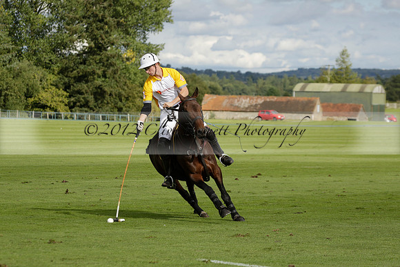 Aryana (black) v Shoreline (yellow) in a Farewell Cup polo match played on Ambersham 5 at Cowdray Park Polo Club on Wednesday 18 September 2013. www.polopictures.co.uk