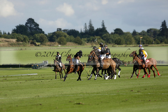 Aryana (black) v Shoreline (yellow) in a Farewell Cup polo match played on Ambersham 5 at Cowdray Park Polo Club on Wednesday 18 September 2013. www.polopictures.co.uk