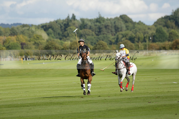 Aryana (black) v Shoreline (yellow) in a Farewell Cup polo match played on Ambersham 5 at Cowdray Park Polo Club on Wednesday 18 September 2013. www.polopictures.co.uk