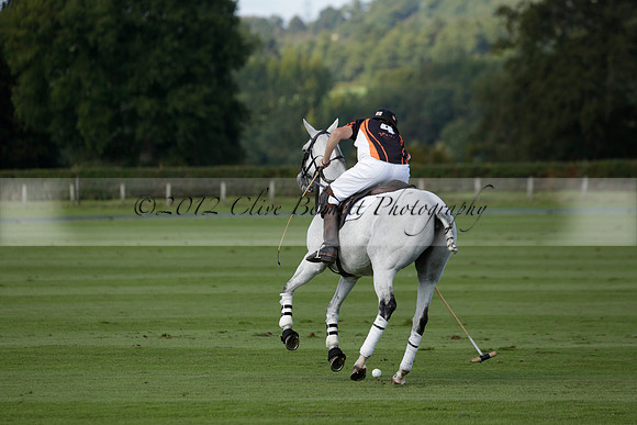 Four Quarters Black (black) v BHC (red) in a Autumn Cup polo match on Ambersham 2 at Cowdray Park Polo Club on Friday 20 September 2013 www.polopictures.co.uk