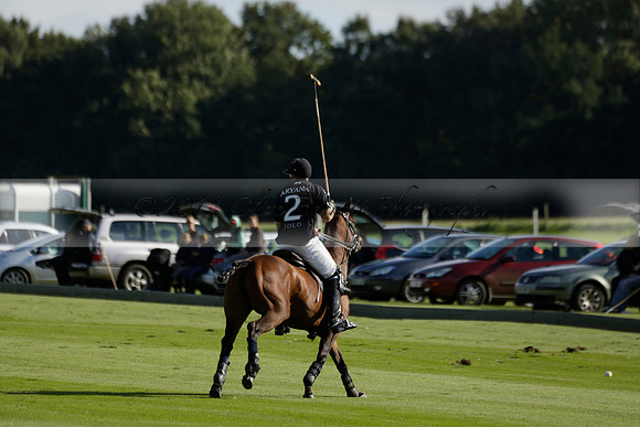Aryana (black) v Shoreline (yellow) in a Farewell Cup polo match played on Ambersham 5 at Cowdray Park Polo Club on Wednesday 18 September 2013. www.polopictures.co.uk