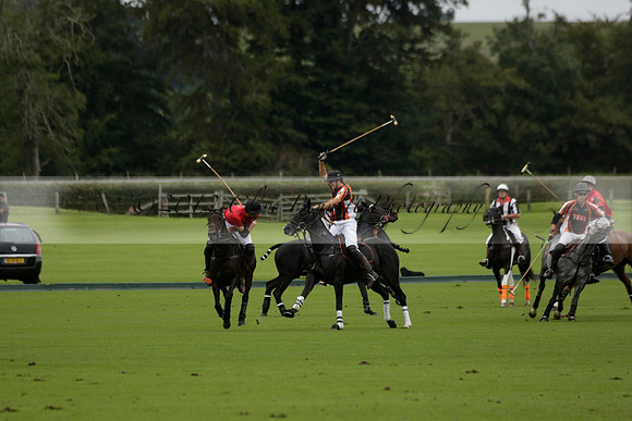 Four Quarters Black (black) v Clashleigh (red) in the Autumn Cup subsidiary final polo match on Ambersham 2 at Cowdray Park Polo Club on Sunday 22 September 2013 www.polopictures.co.uk