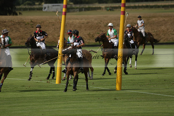Jaeger Le Coultre (black)  v Wairakei Pastoral (white) in a Jaeger Le Coultre Holden White Cup polo match played on 29 July 2013 at Cowdray Park Polo Club on Brooksfieldwww.polopictures.co.uk