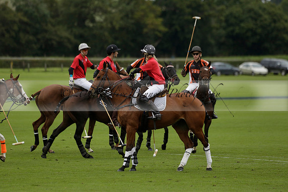 Four Quarters Black (black) v Clashleigh (red) in the Autumn Cup subsidiary final polo match on Ambersham 2 at Cowdray Park Polo Club on Sunday 22 September 2013 www.polopictures.co.uk