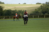 Four Quarters Black (black) v BHC (red) in a Autumn Cup polo match on Ambersham 2 at Cowdray Park Polo Club on Friday 20 September 2013 www.polopictures.co.uk
