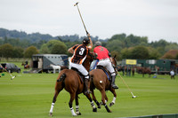 Four Quarters Black (black) v Clashleigh (red) in the Autumn Cup subsidiary final polo match on Ambersham 2 at Cowdray Park Polo Club on Sunday 22 September 2013 www.polopictures.co.uk