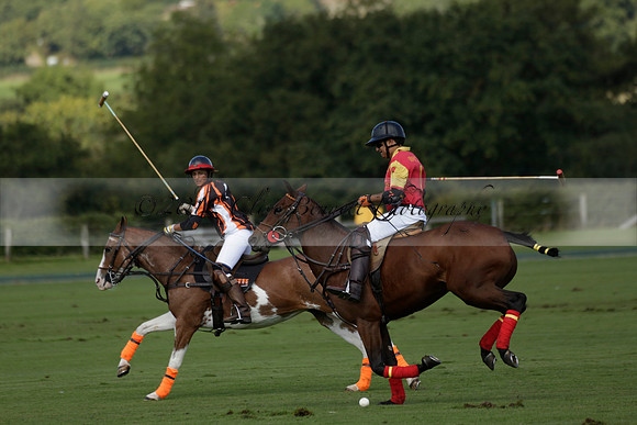 Four Quarters Black (black) v BHC (red) in a Autumn Cup polo match on Ambersham 2 at Cowdray Park Polo Club on Friday 20 September 2013 www.polopictures.co.uk