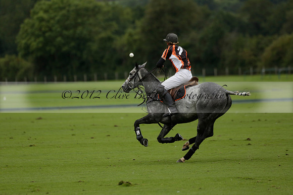 Four Quarters Black (black) v Clashleigh (red) in the Autumn Cup subsidiary final polo match on Ambersham 2 at Cowdray Park Polo Club on Sunday 22 September 2013 www.polopictures.co.uk