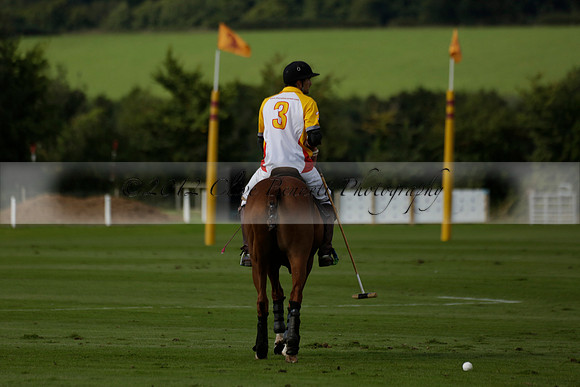 Aryana (black) v Shoreline (yellow) in a Farewell Cup polo match played on Ambersham 5 at Cowdray Park Polo Club on Wednesday 18 September 2013. www.polopictures.co.uk