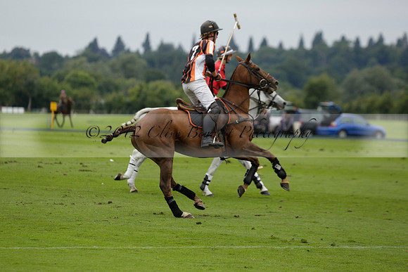 Four Quarters Black (black) v Clashleigh (red) in the Autumn Cup subsidiary final polo match on Ambersham 2 at Cowdray Park Polo Club on Sunday 22 September 2013 www.polopictures.co.uk