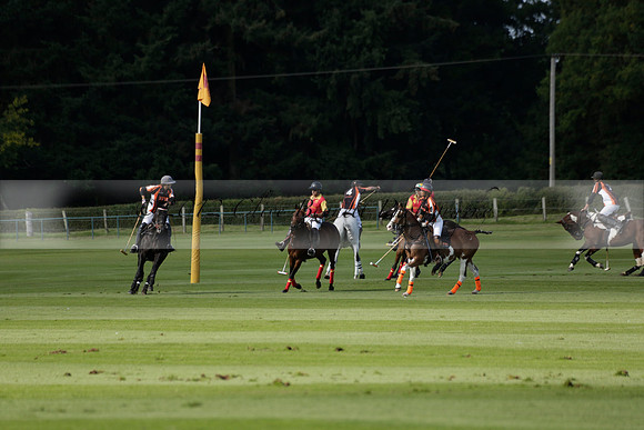 Four Quarters Black (black) v BHC (red) in a Autumn Cup polo match on Ambersham 2 at Cowdray Park Polo Club on Friday 20 September 2013 www.polopictures.co.uk