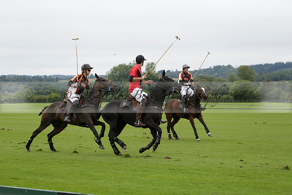 Four Quarters Black (black) v Clashleigh (red) in the Autumn Cup subsidiary final polo match on Ambersham 2 at Cowdray Park Polo Club on Sunday 22 September 2013 www.polopictures.co.uk