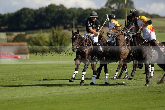 Aryana (black) v Shoreline (yellow) in a Farewell Cup polo match played on Ambersham 5 at Cowdray Park Polo Club on Wednesday 18 September 2013. www.polopictures.co.uk