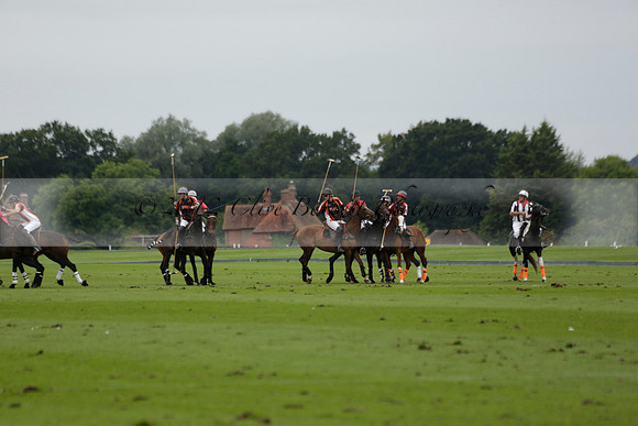 Four Quarters Black (black) v Clashleigh (red) in the Autumn Cup subsidiary final polo match on Ambersham 2 at Cowdray Park Polo Club on Sunday 22 September 2013 www.polopictures.co.uk