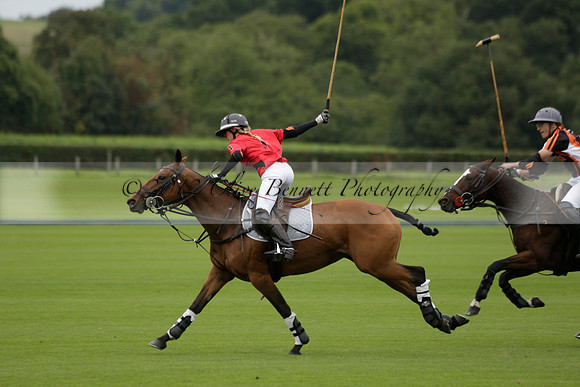 Four Quarters Black (black) v Clashleigh (red) in the Autumn Cup subsidiary final polo match on Ambersham 2 at Cowdray Park Polo Club on Sunday 22 September 2013 www.polopictures.co.uk