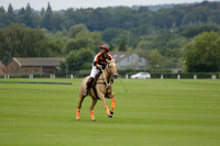 Four Quarters Black (black) v Clashleigh (red) in the Autumn Cup subsidiary final polo match on Ambersham 2 at Cowdray Park Polo Club on Sunday 22 September 2013 www.polopictures.co.uk