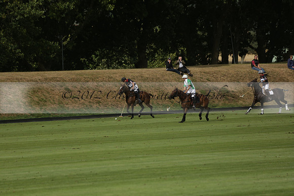Jaeger Le Coultre (black)  v Wairakei Pastoral (white) in a Jaeger Le Coultre Holden White Cup polo match played on 29 July 2013 at Cowdray Park Polo Club on Brooksfieldwww.polopictures.co.uk