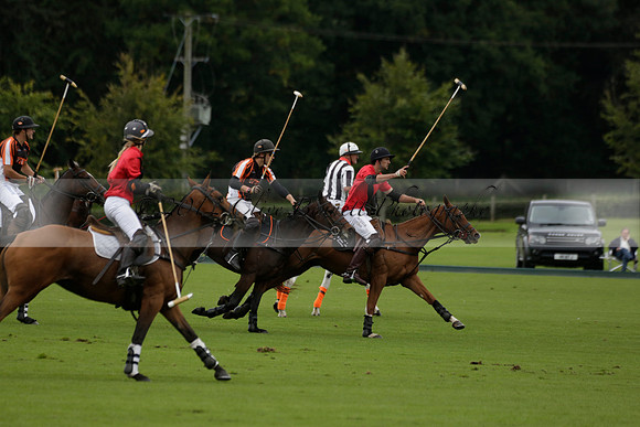 Four Quarters Black (black) v Clashleigh (red) in the Autumn Cup subsidiary final polo match on Ambersham 2 at Cowdray Park Polo Club on Sunday 22 September 2013 www.polopictures.co.uk
