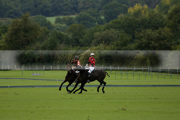 Four Quarters Black (black) v Clashleigh (red) in the Autumn Cup subsidiary final polo match on Ambersham 2 at Cowdray Park Polo Club on Sunday 22 September 2013 www.polopictures.co.uk