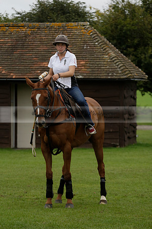 Four Quarters Black (black) v Clashleigh (red) in the Autumn Cup subsidiary final polo match on Ambersham 2 at Cowdray Park Polo Club on Sunday 22 September 2013 www.polopictures.co.uk