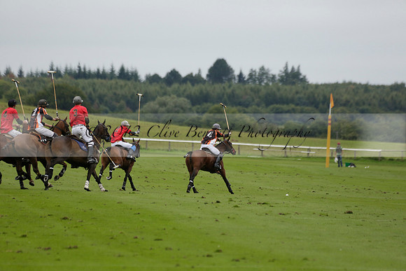 Four Quarters Black (black) v Clashleigh (red) in the Autumn Cup subsidiary final polo match on Ambersham 2 at Cowdray Park Polo Club on Sunday 22 September 2013 www.polopictures.co.uk