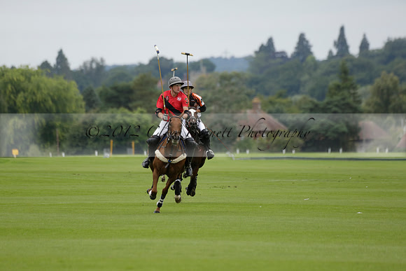 Four Quarters Black (black) v Clashleigh (red) in the Autumn Cup subsidiary final polo match on Ambersham 2 at Cowdray Park Polo Club on Sunday 22 September 2013 www.polopictures.co.uk