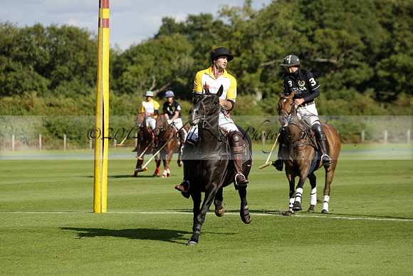 Aryana (black) v Shoreline (yellow) in a Farewell Cup polo match played on Ambersham 5 at Cowdray Park Polo Club on Wednesday 18 September 2013. www.polopictures.co.uk