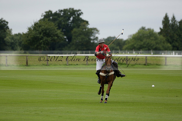 Four Quarters Black (black) v Clashleigh (red) in the Autumn Cup subsidiary final polo match on Ambersham 2 at Cowdray Park Polo Club on Sunday 22 September 2013 www.polopictures.co.uk
