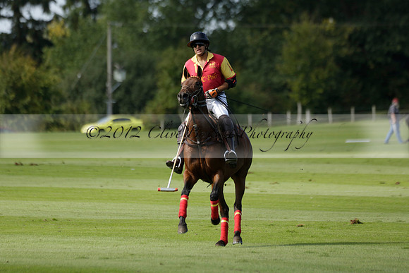 Four Quarters Black (black) v BHC (red) in a Autumn Cup polo match on Ambersham 2 at Cowdray Park Polo Club on Friday 20 September 2013 www.polopictures.co.uk