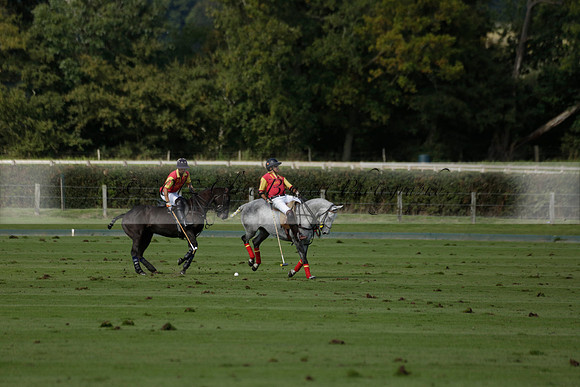 Four Quarters Black (black) v BHC (red) in a Autumn Cup polo match on Ambersham 2 at Cowdray Park Polo Club on Friday 20 September 2013 www.polopictures.co.uk