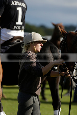 Aryana (black) v Shoreline (yellow) in a Farewell Cup polo match played on Ambersham 5 at Cowdray Park Polo Club on Wednesday 18 September 2013. www.polopictures.co.uk