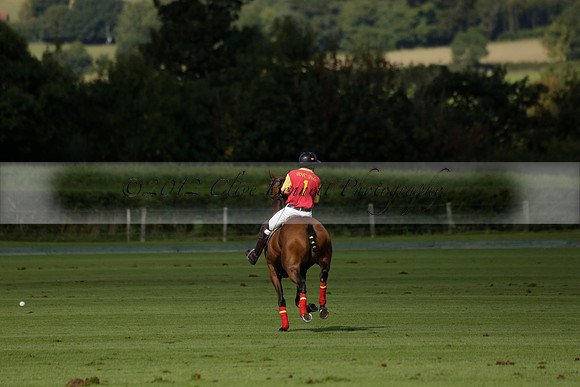Four Quarters Black (black) v BHC (red) in a Autumn Cup polo match on Ambersham 2 at Cowdray Park Polo Club on Friday 20 September 2013 www.polopictures.co.uk