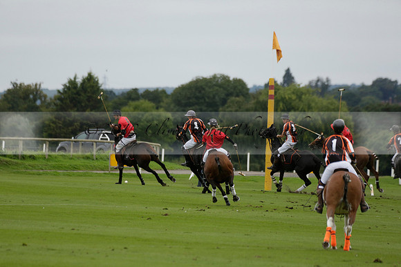 Four Quarters Black (black) v Clashleigh (red) in the Autumn Cup subsidiary final polo match on Ambersham 2 at Cowdray Park Polo Club on Sunday 22 September 2013 www.polopictures.co.uk