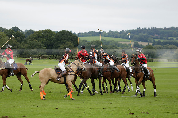 Four Quarters Black (black) v Clashleigh (red) in the Autumn Cup subsidiary final polo match on Ambersham 2 at Cowdray Park Polo Club on Sunday 22 September 2013 www.polopictures.co.uk