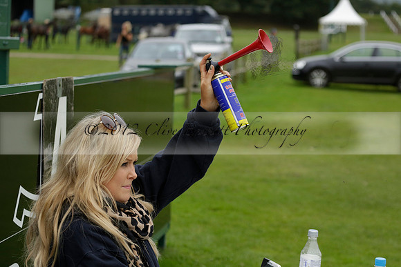 Four Quarters Black (black) v Clashleigh (red) in the Autumn Cup subsidiary final polo match on Ambersham 2 at Cowdray Park Polo Club on Sunday 22 September 2013 www.polopictures.co.uk