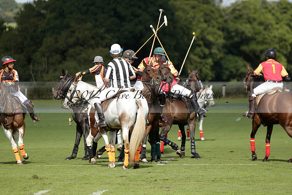 Four Quarters Black (black) v BHC (red) in a Autumn Cup polo match on Ambersham 2 at Cowdray Park Polo Club on Friday 20 September 2013 www.polopictures.co.uk