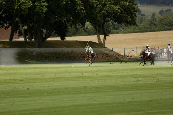 Jaeger Le Coultre (black)  v Wairakei Pastoral (white) in a Jaeger Le Coultre Holden White Cup polo match played on 29 July 2013 at Cowdray Park Polo Club on Brooksfieldwww.polopictures.co.uk