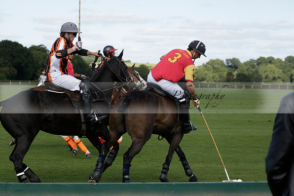 Four Quarters Black (black) v BHC (red) in a Autumn Cup polo match on Ambersham 2 at Cowdray Park Polo Club on Friday 20 September 2013 www.polopictures.co.uk