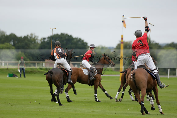 Four Quarters Black (black) v Clashleigh (red) in the Autumn Cup subsidiary final polo match on Ambersham 2 at Cowdray Park Polo Club on Sunday 22 September 2013 www.polopictures.co.uk