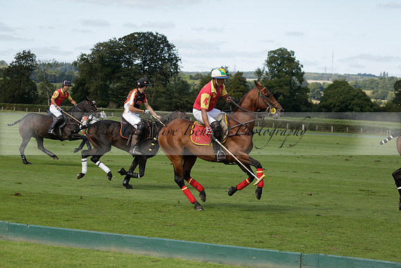 Four Quarters Black (black) v BHC (red) in a Autumn Cup polo match on Ambersham 2 at Cowdray Park Polo Club on Friday 20 September 2013 www.polopictures.co.uk