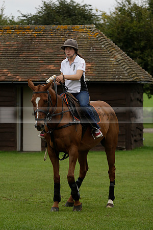 Four Quarters Black (black) v Clashleigh (red) in the Autumn Cup subsidiary final polo match on Ambersham 2 at Cowdray Park Polo Club on Sunday 22 September 2013 www.polopictures.co.uk