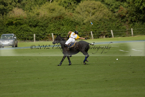 Aryana (black) v Shoreline (yellow) in a Farewell Cup polo match played on Ambersham 5 at Cowdray Park Polo Club on Wednesday 18 September 2013. www.polopictures.co.uk