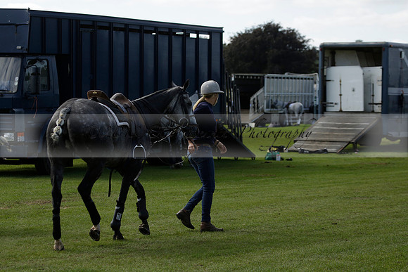 Four Quarters Black (black) v BHC (red) in a Autumn Cup polo match on Ambersham 2 at Cowdray Park Polo Club on Friday 20 September 2013 www.polopictures.co.uk