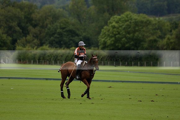 Four Quarters Black (black) v Clashleigh (red) in the Autumn Cup subsidiary final polo match on Ambersham 2 at Cowdray Park Polo Club on Sunday 22 September 2013 www.polopictures.co.uk