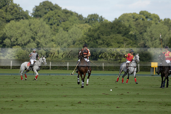 Four Quarters Black (black) v BHC (red) in a Autumn Cup polo match on Ambersham 2 at Cowdray Park Polo Club on Friday 20 September 2013 www.polopictures.co.uk