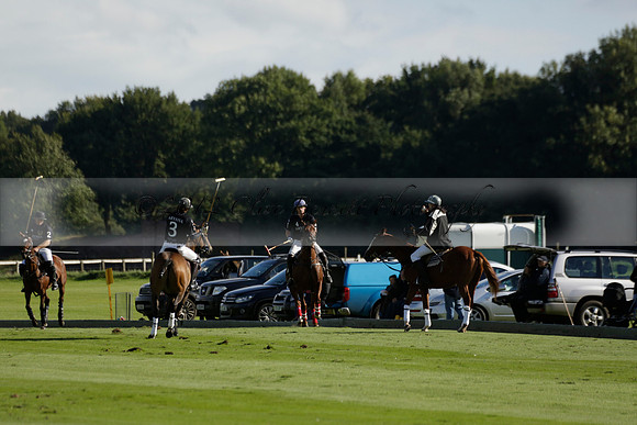 Aryana (black) v Shoreline (yellow) in a Farewell Cup polo match played on Ambersham 5 at Cowdray Park Polo Club on Wednesday 18 September 2013. www.polopictures.co.uk