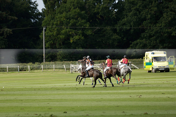 Four Quarters Black (black) v BHC (red) in a Autumn Cup polo match on Ambersham 2 at Cowdray Park Polo Club on Friday 20 September 2013 www.polopictures.co.uk